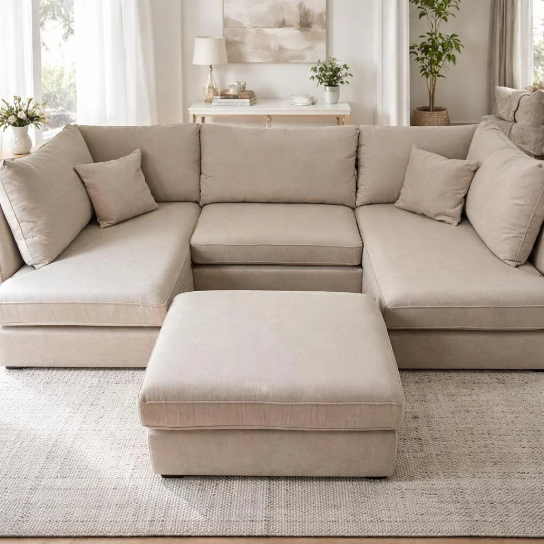 U Shape Couch Jumbo Cord Living Room Elegant Design Beige jumbo cord U-shape couch with matching ottoman in a cozy contemporary living room.