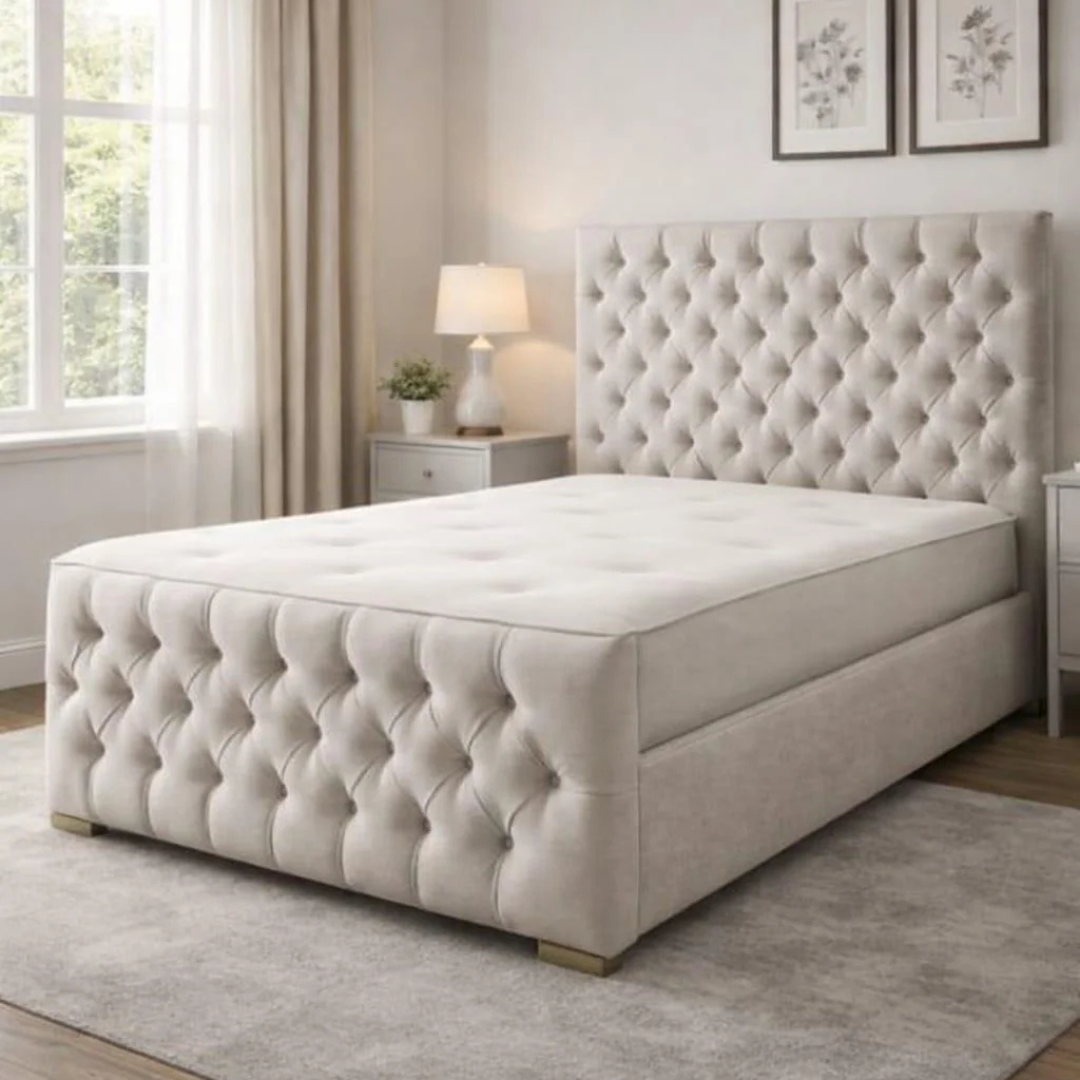 Florida Classic upholstered bed in cream fabric with deep button tufted headboard and footboard.